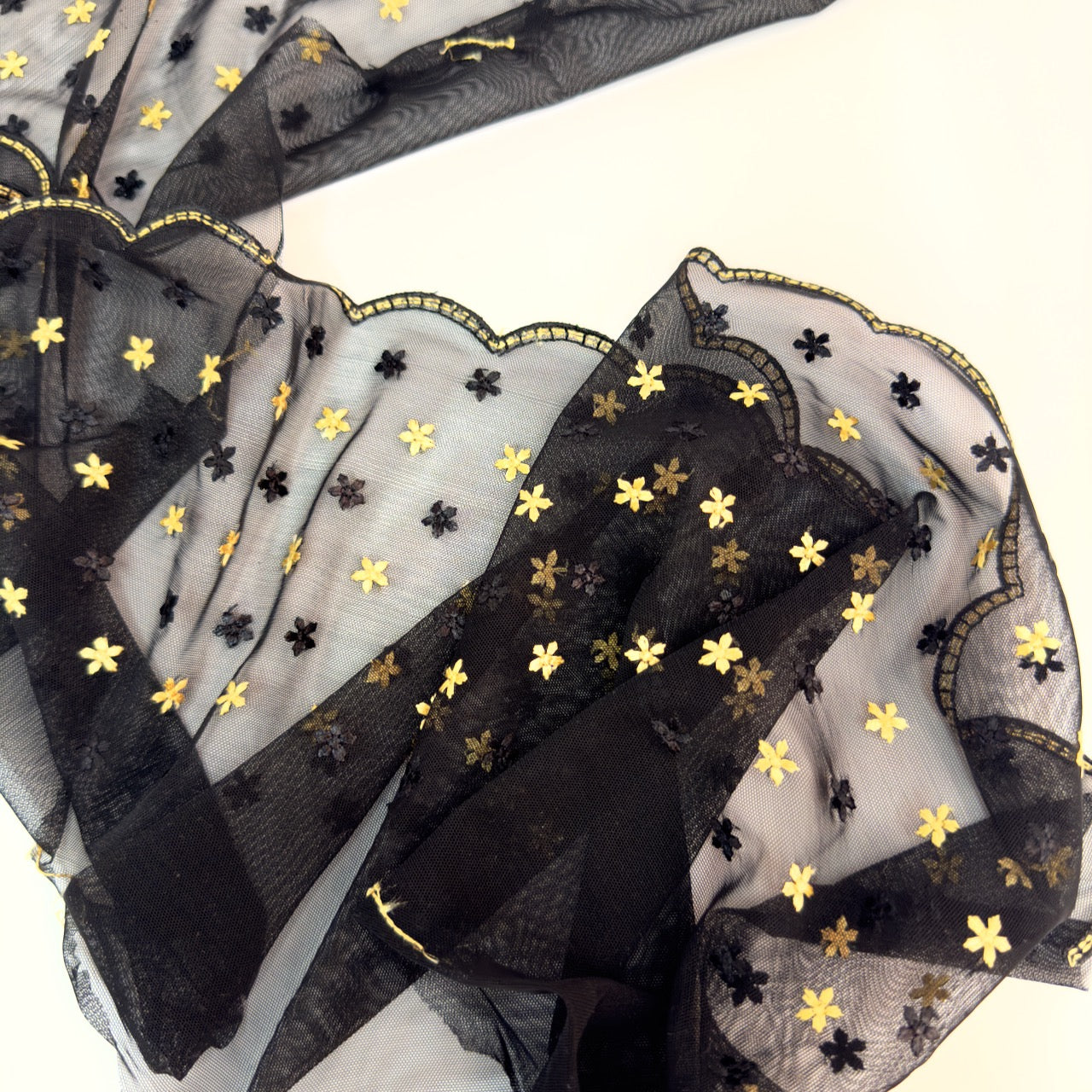 Black and gold stars stretch mesh